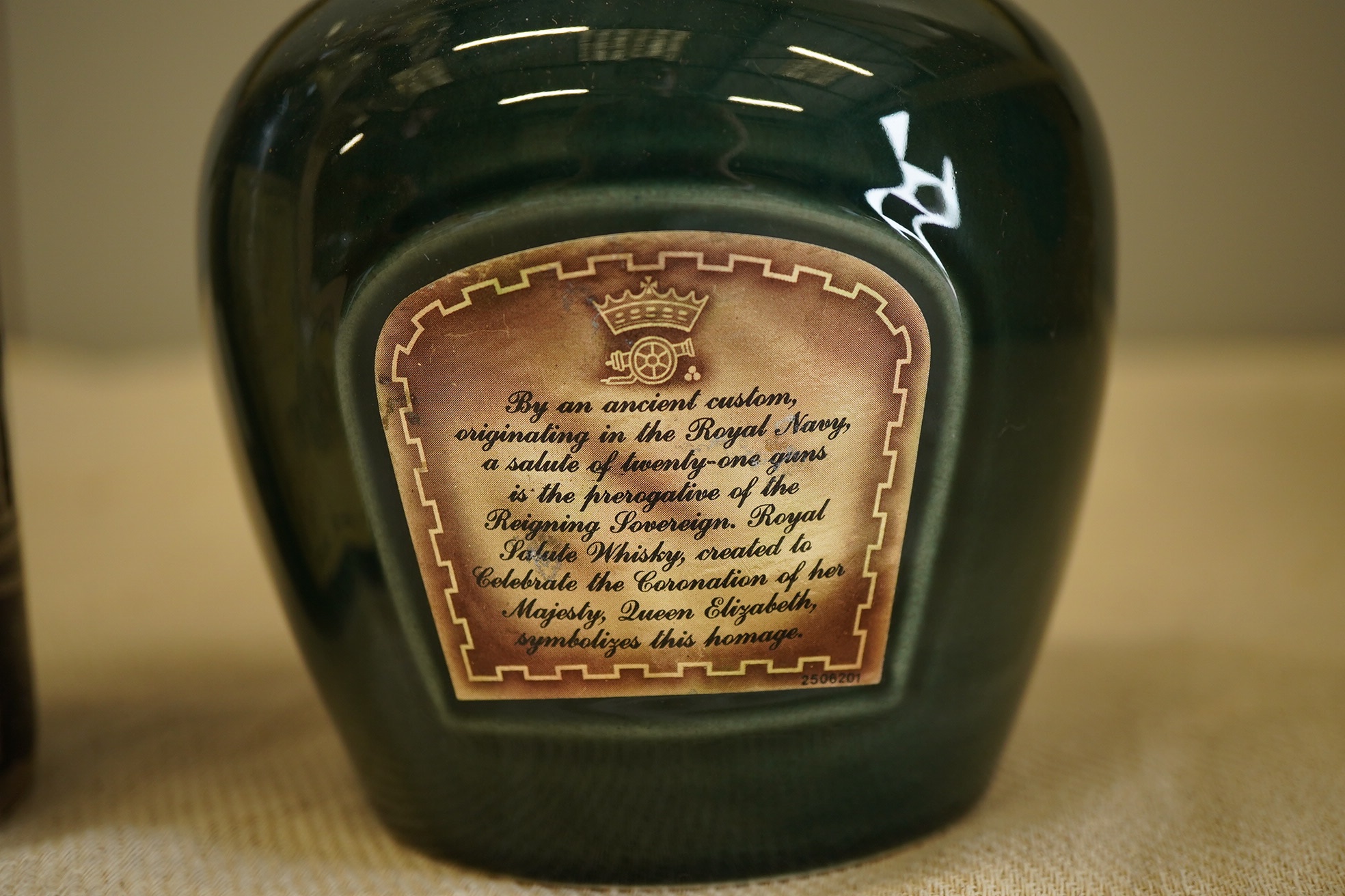 One bottle of 1957 Tokaji Aszu and one ceramic bottle of Chivas Royal Salute Scotch Whisky (2)